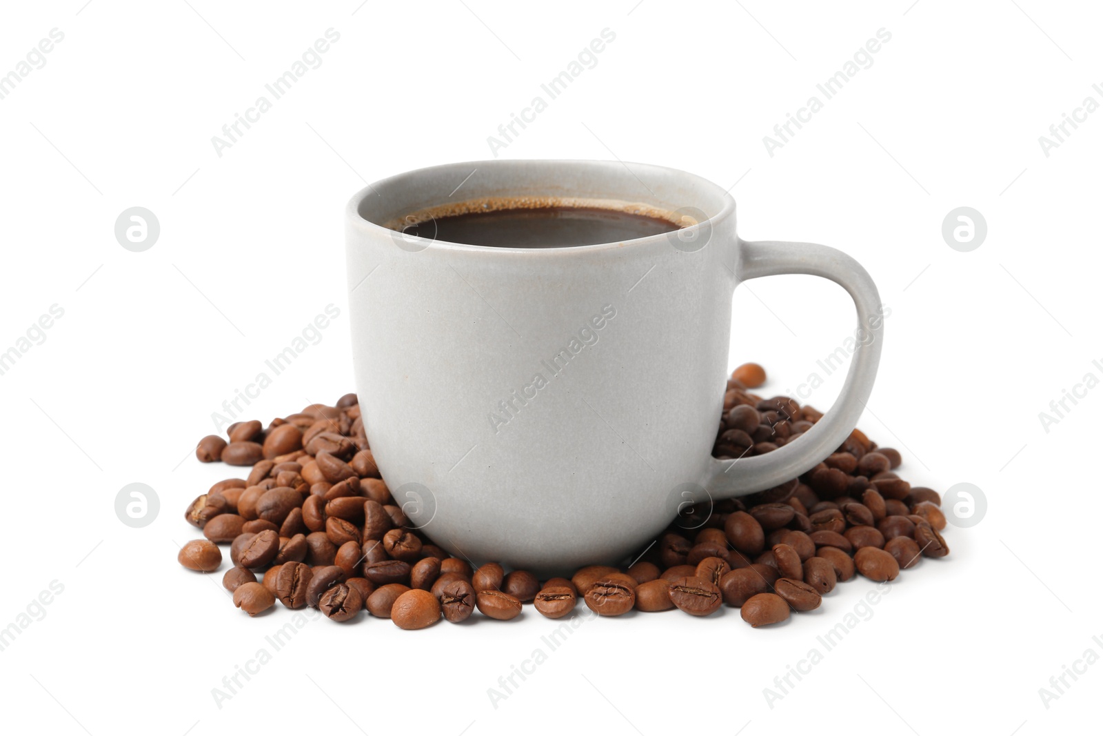 Aromatic coffee in cup and pile of beans isolated on white Photo of Aromatic coffee in cup and pile of beans isolated on white
