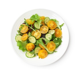 Photo of Fresh salad with yellow tomatoes isolated on white, top view