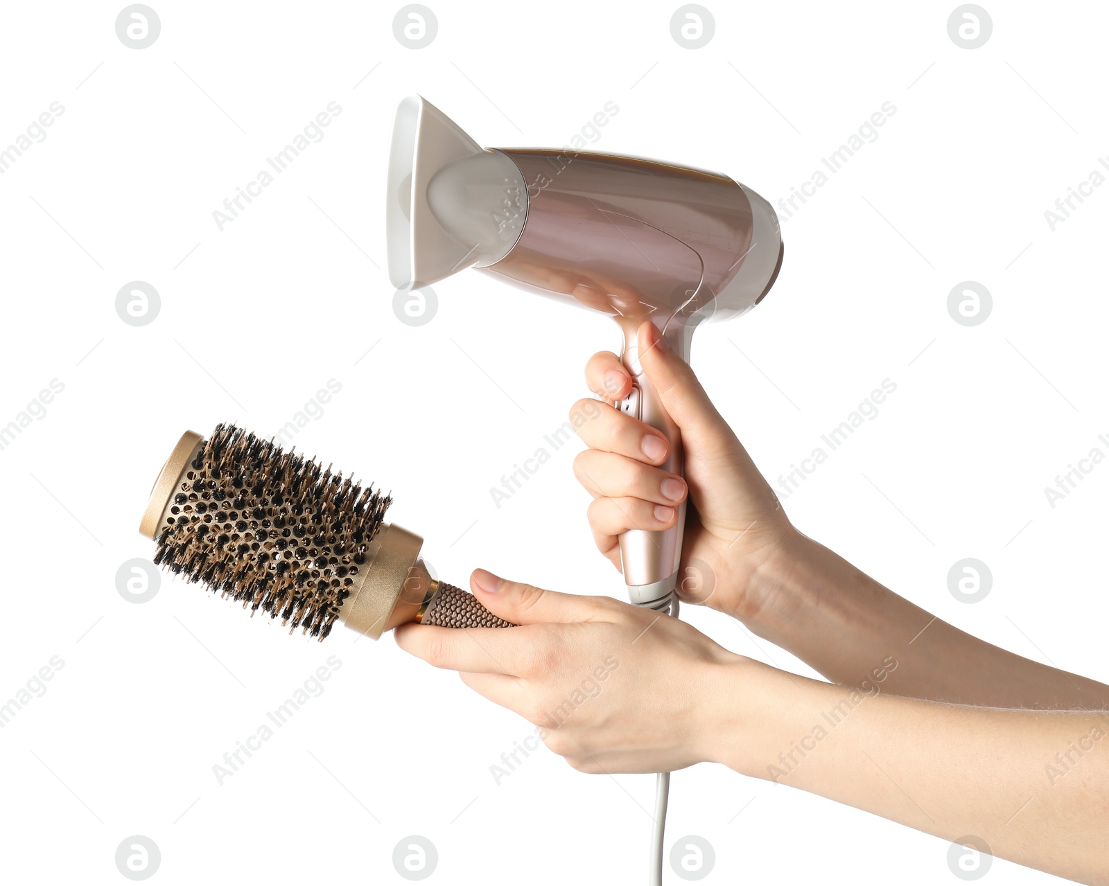 Woman with hair dryer and round brush on white background, closeup Photo of Woman with hair dryer and round brush on white background, closeup