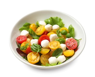 Photo of Tasty salad with yellow tomatoes, basil and mozzarella cheese isolated on white