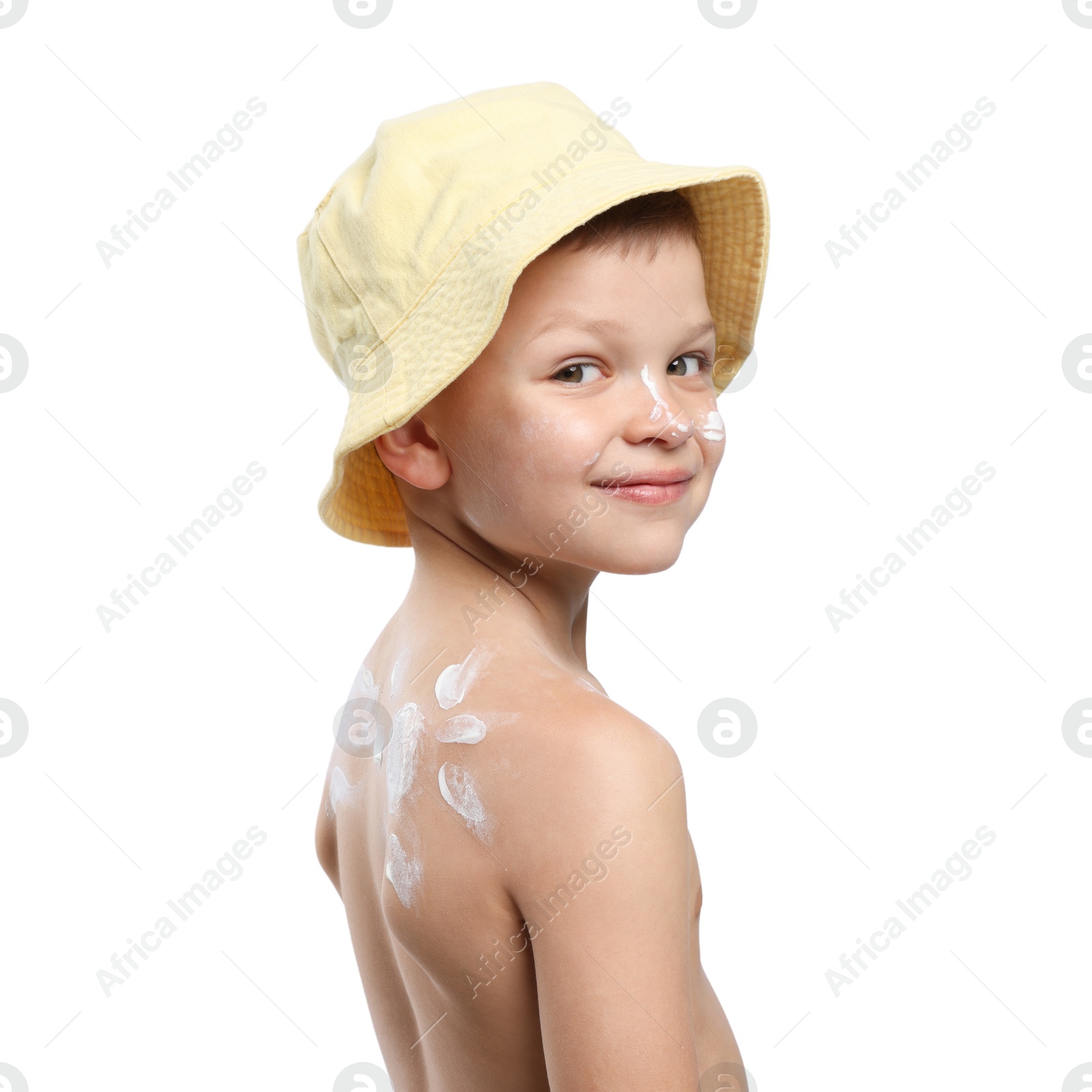 Little boy with sun protection cream on his skin against white background Photo of Little boy with sun protection cream on his skin against white background