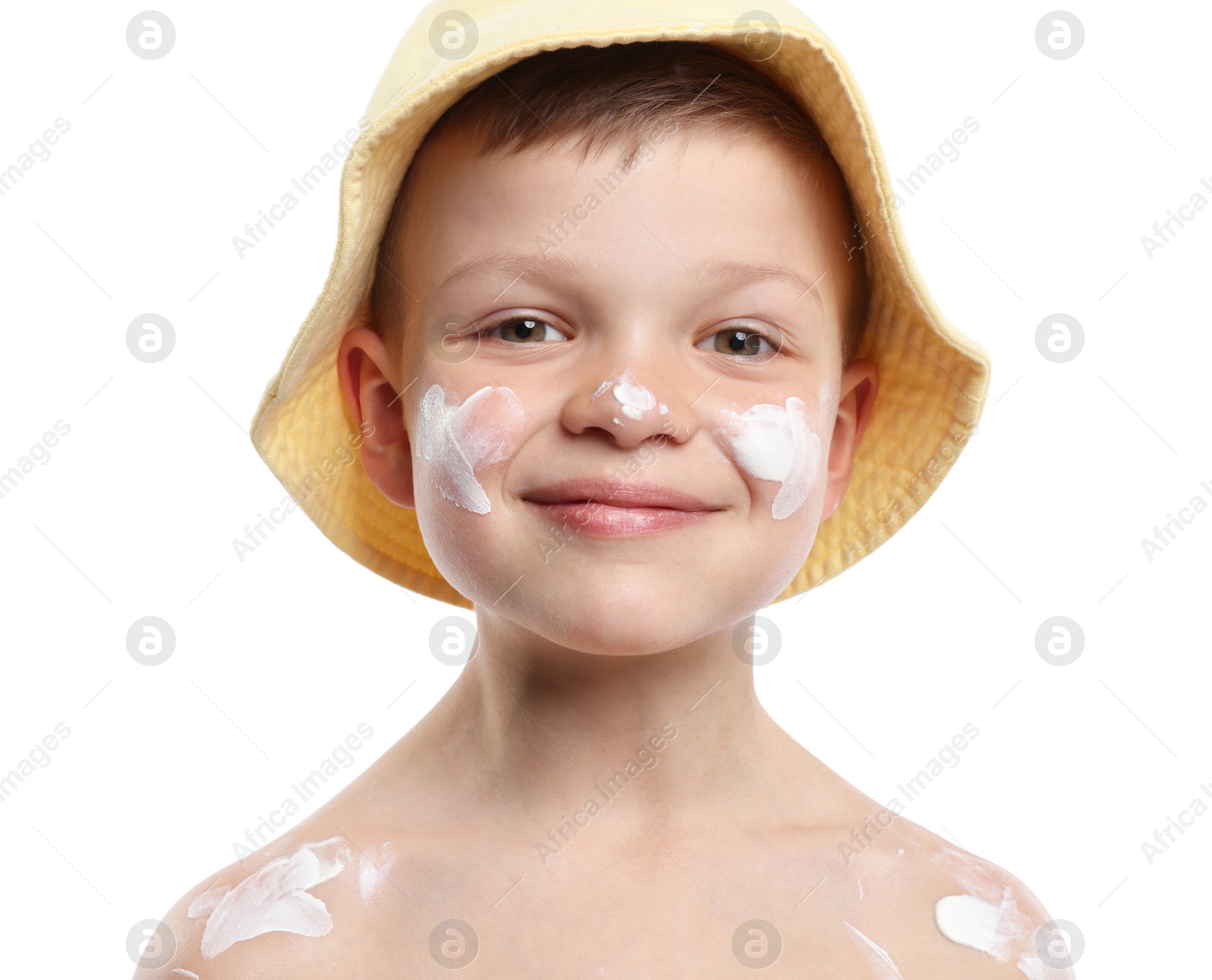 Little boy with sun protection cream on his skin against white background Photo of Little boy with sun protection cream on his skin against white background