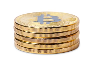Photo of Cryptocurrency. Many golden bitcoins isolated on white