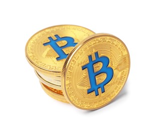 Photo of Cryptocurrency. Many golden bitcoins isolated on white