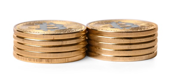 Photo of Cryptocurrency. Many golden bitcoins isolated on white