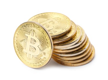 Photo of Cryptocurrency. Many golden bitcoins isolated on white
