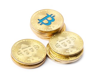 Photo of Cryptocurrency. Many golden bitcoins isolated on white