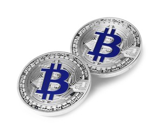 Photo of Cryptocurrency. Two silver bitcoins isolated on white