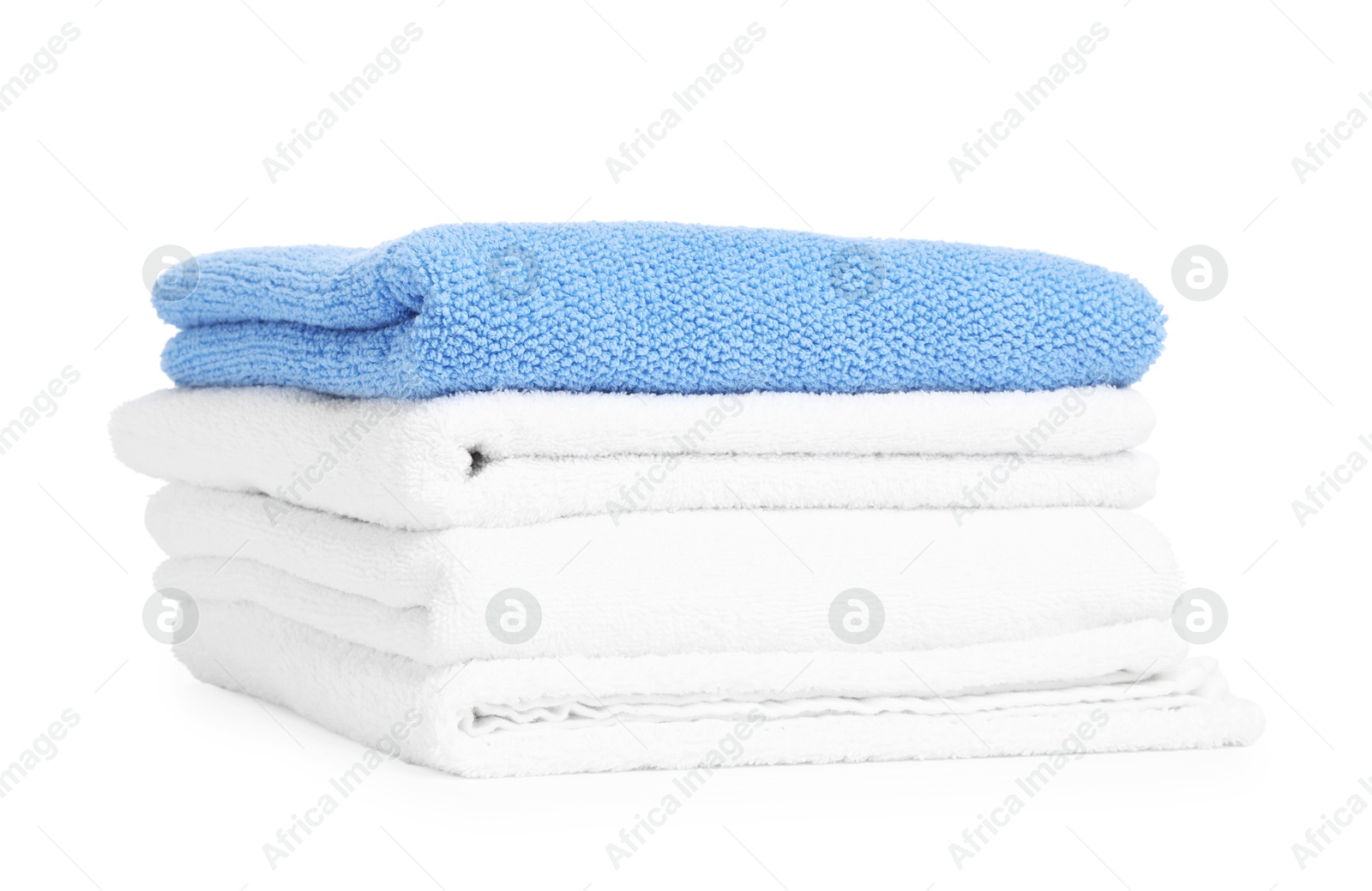 Stack of clean towels isolated on white Photo of Stack of clean towels isolated on white