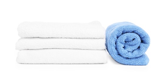 Photo of Many folded terry towels isolated on white