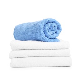 Photo of Many folded terry towels isolated on white