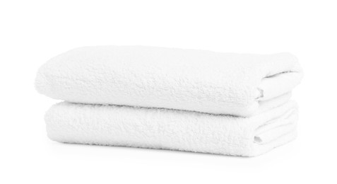 Photo of Two folded terry towels isolated on white