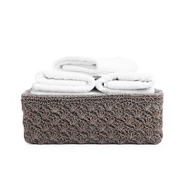 Photo of Clean towels in basket isolated on white