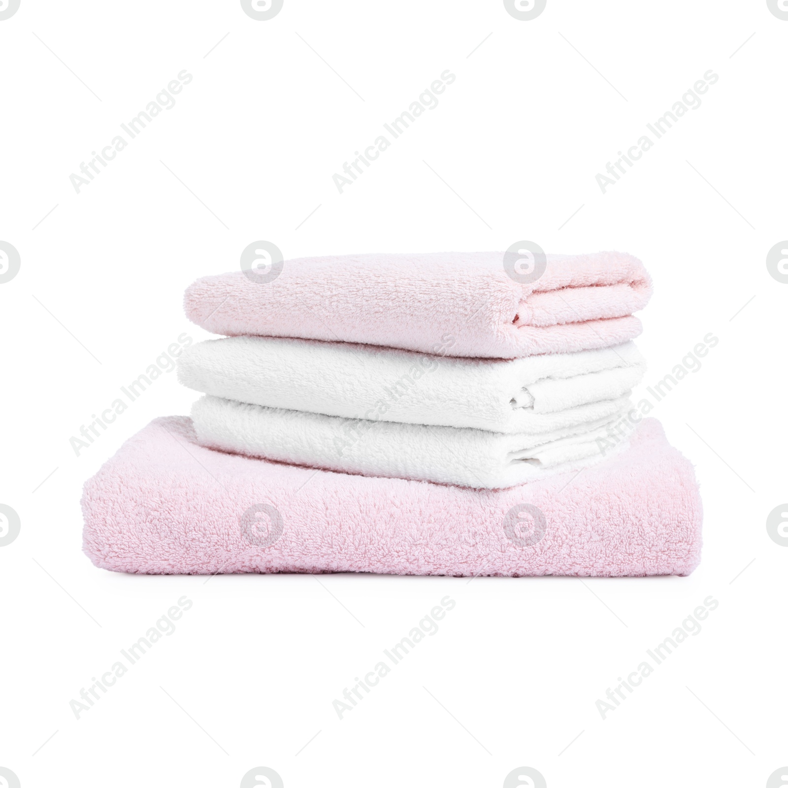 Stack of clean towels isolated on white Photo of Stack of clean towels isolated on white