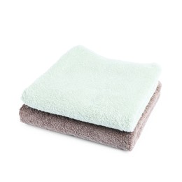 Photo of Two folded terry towels isolated on white