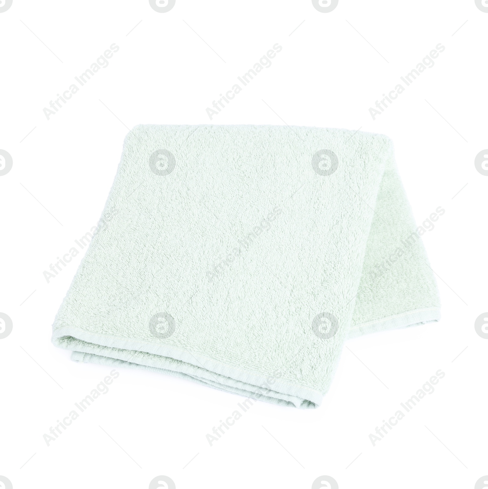 Green towel isolated on white, top view Photo of Green towel isolated on white, top view