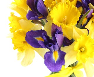 Photo of Bouquet of beautiful daffodils and irises isolated on white