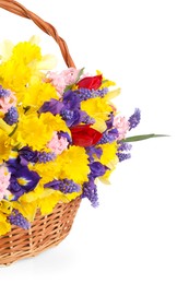 Photo of Beautiful colorful flowers in basket isolated on white