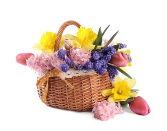 Photo of Beautiful colorful flowers in basket isolated on white