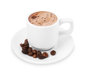 Photo of Aromatic coffee in cup, beans and saucer isolated on white