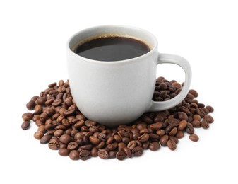 Photo of Aromatic coffee in cup and pile of beans isolated on white