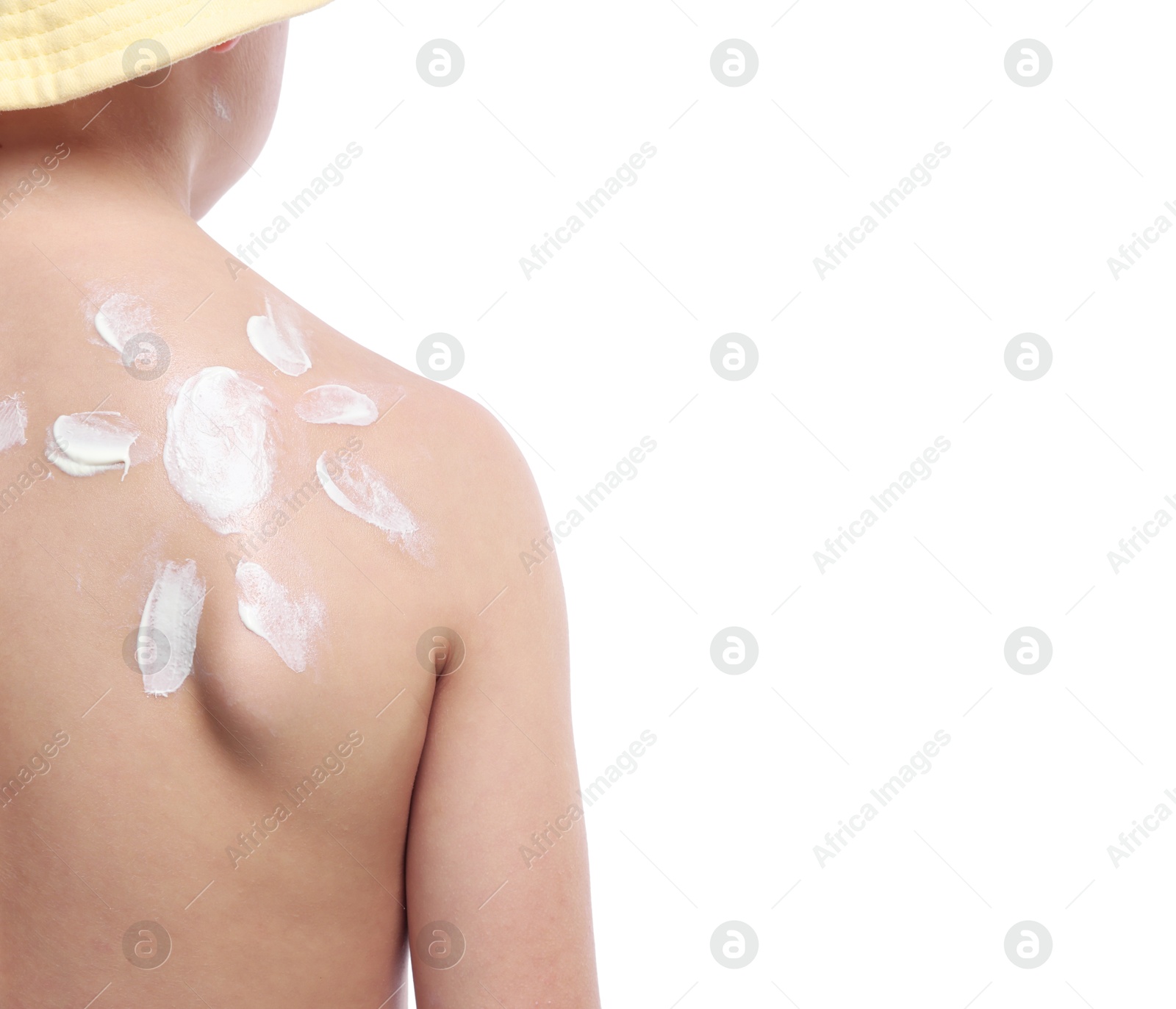 Photo of Little boy with sun protection cream on his skin against white background, back view