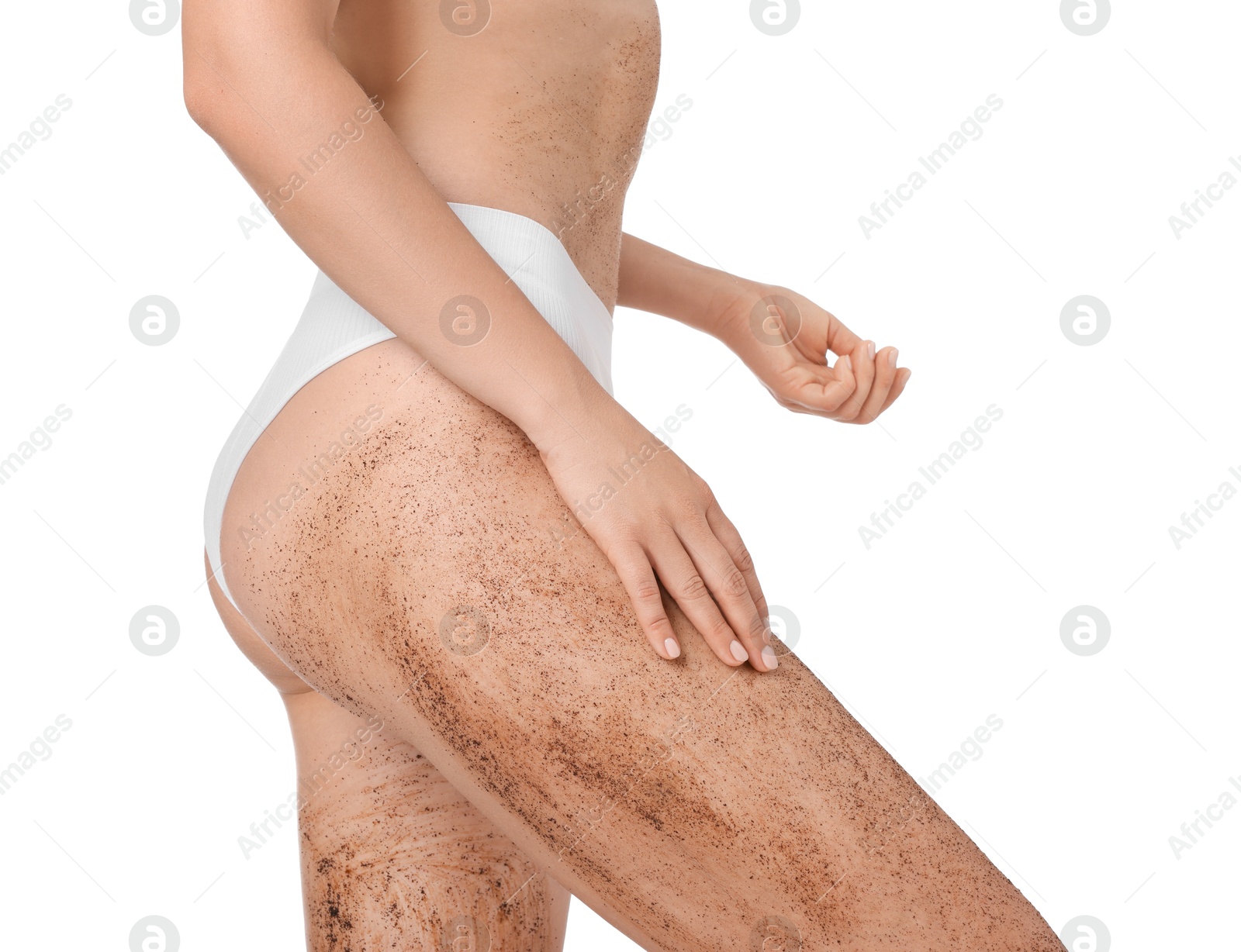 Photo of Woman with body scrub on her leg against white background, closeup