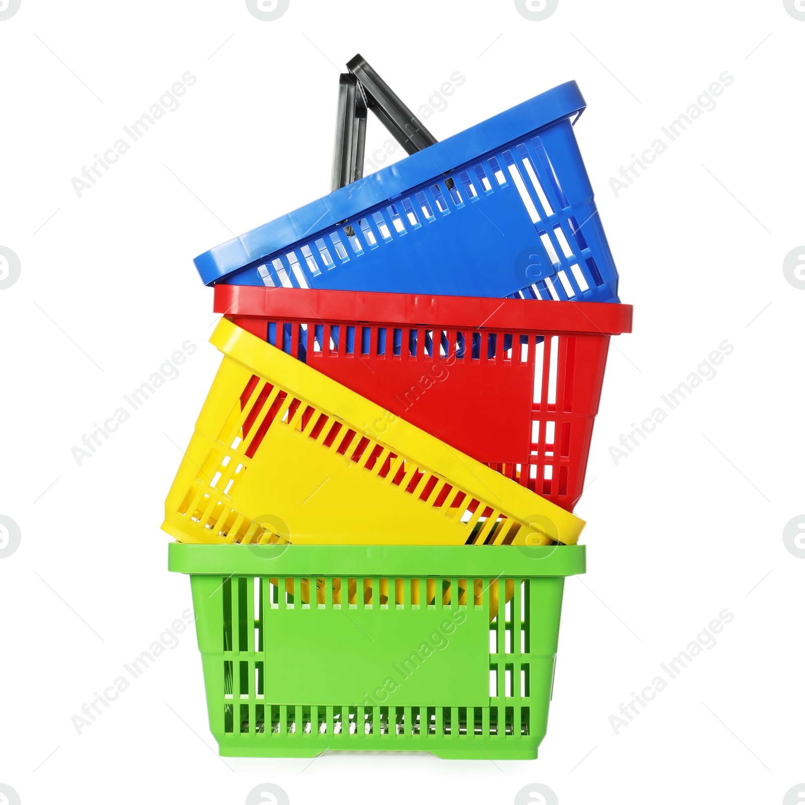 Stack of colorful shopping baskets isolated on white Photo of Stack of colorful shopping baskets isolated on white