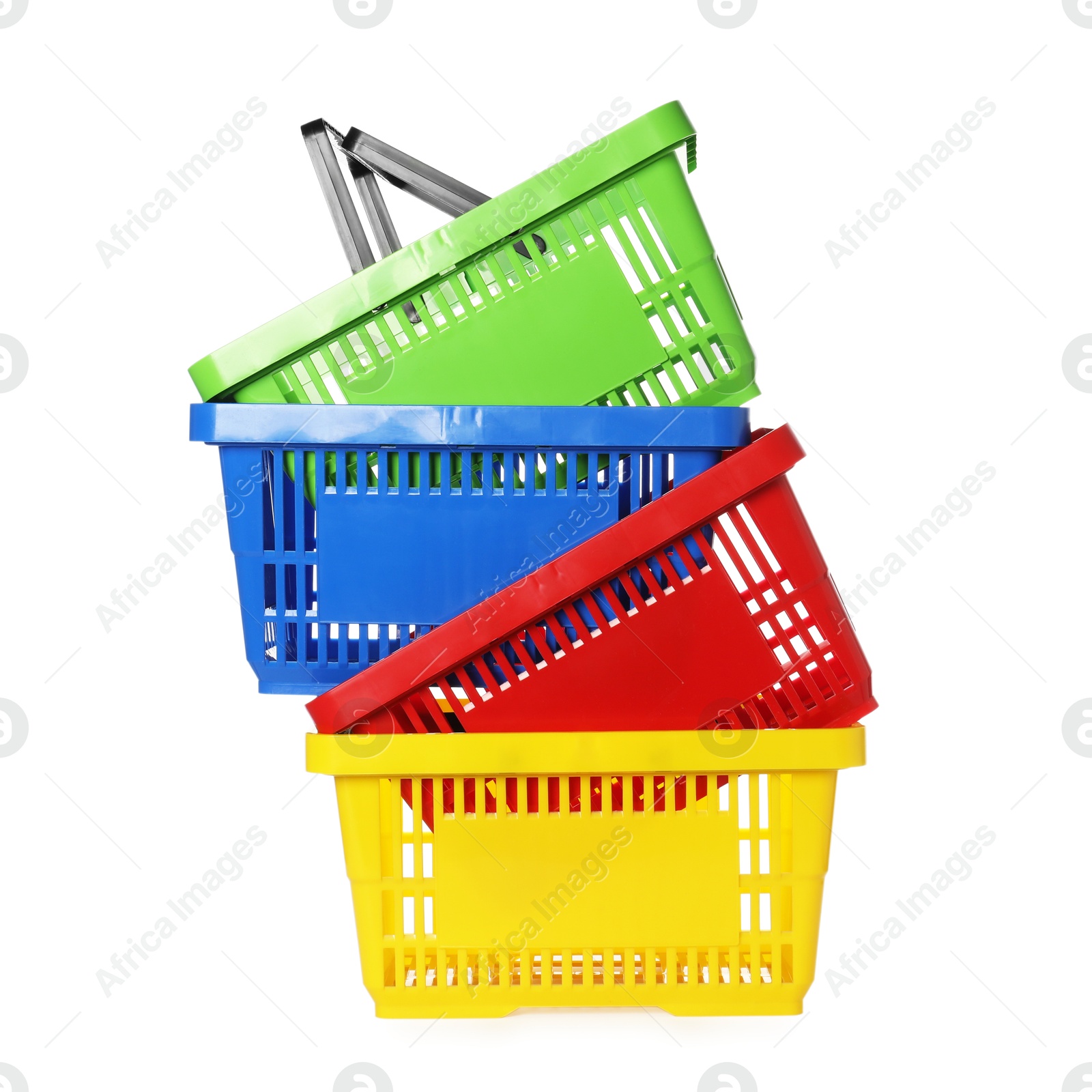 Stack of colorful shopping baskets isolated on white Photo of Stack of colorful shopping baskets isolated on white