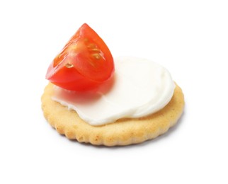 Photo of One tasty cracker with cream cheese and tomato isolated on white