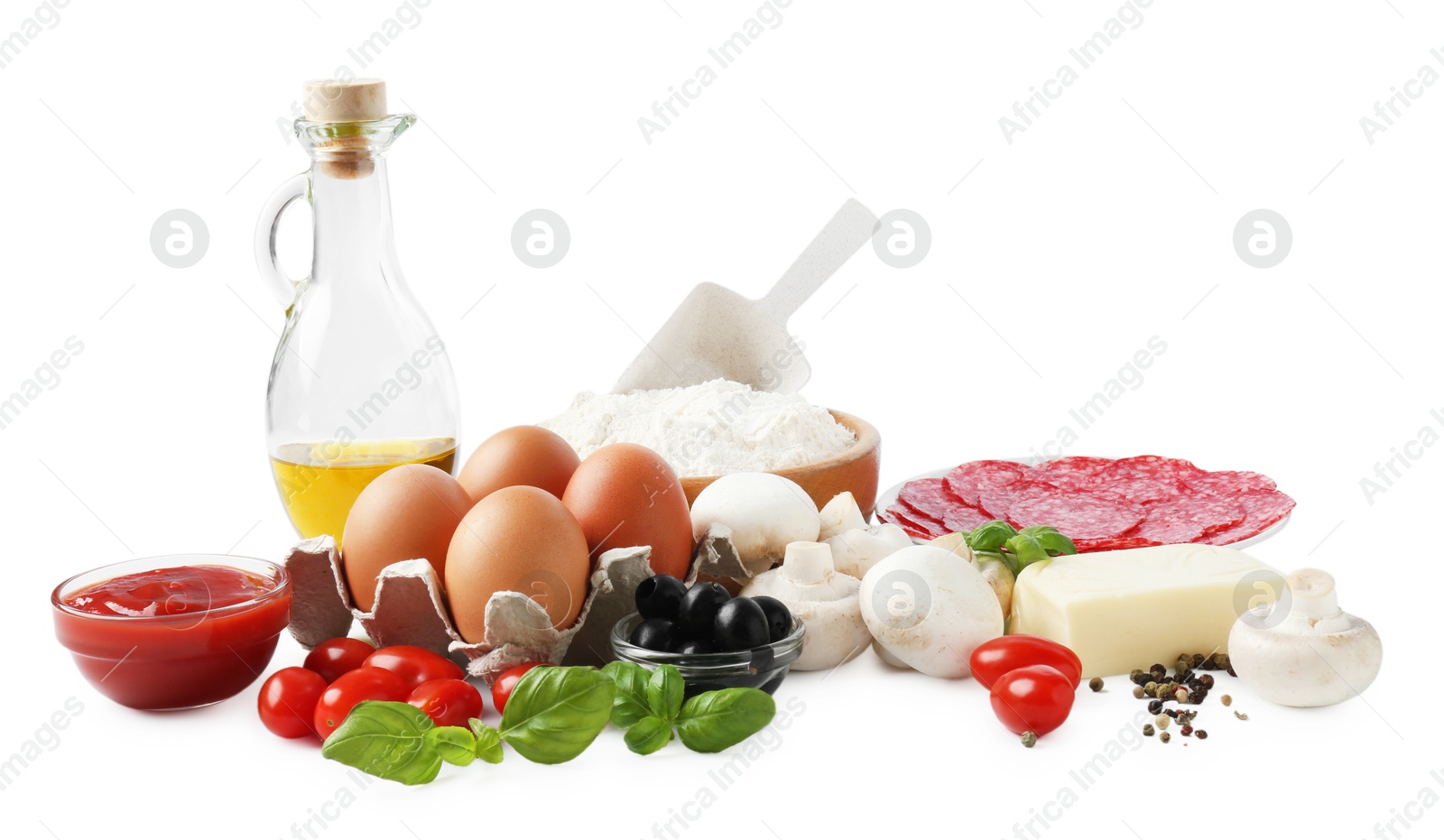 Making pizza. Different ingredients isolated on white Photo of Making pizza. Different ingredients isolated on white