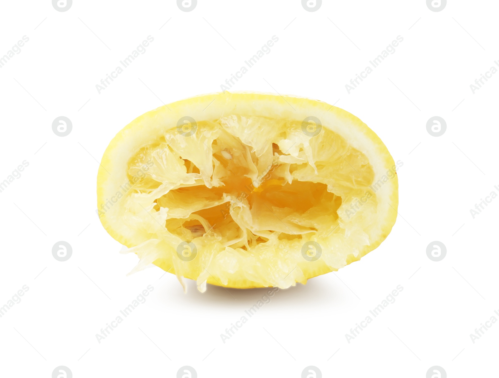 Half of squeezed lemon isolated on white Photo of Half of squeezed lemon isolated on white