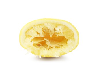 Photo of Half of squeezed lemon isolated on white