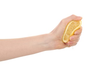 Photo of Woman squeezing lemon on white background, closeup