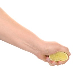 Photo of Woman squeezing lime on white background, closeup