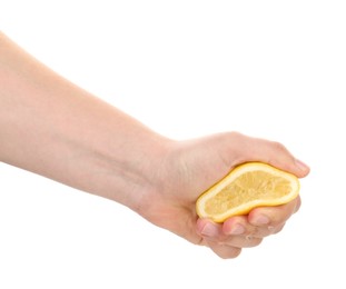 Photo of Woman squeezing lemon on white background, closeup