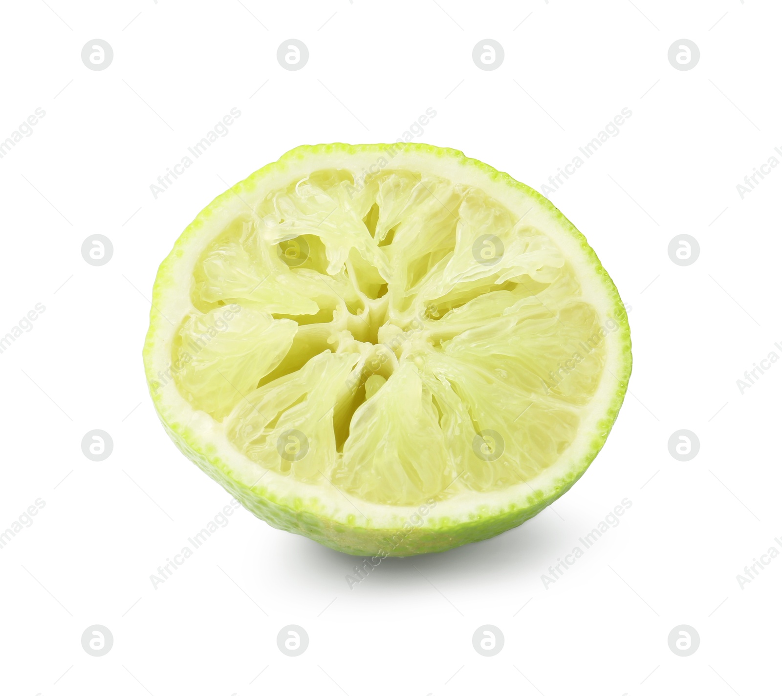 Half of squeezed lime isolated on white Photo of Half of squeezed lime isolated on white