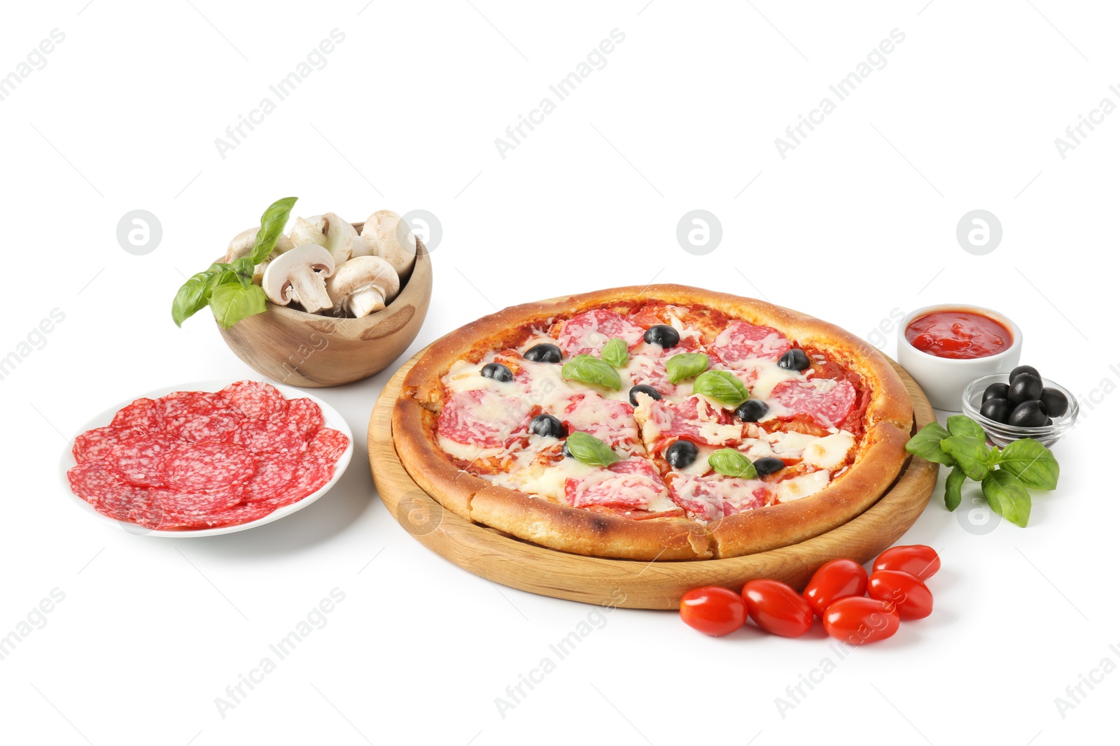 Tasty pizza and ingredients isolated on white Photo of Tasty pizza and ingredients isolated on white