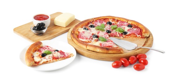 Photo of Tasty pizza and ingredients isolated on white