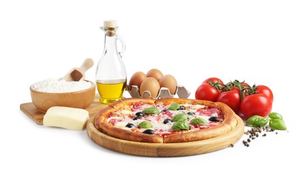 Photo of Tasty pizza and ingredients isolated on white