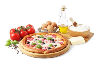 Photo of Tasty pizza and ingredients isolated on white