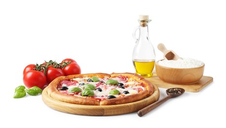 Photo of Tasty pizza and ingredients isolated on white