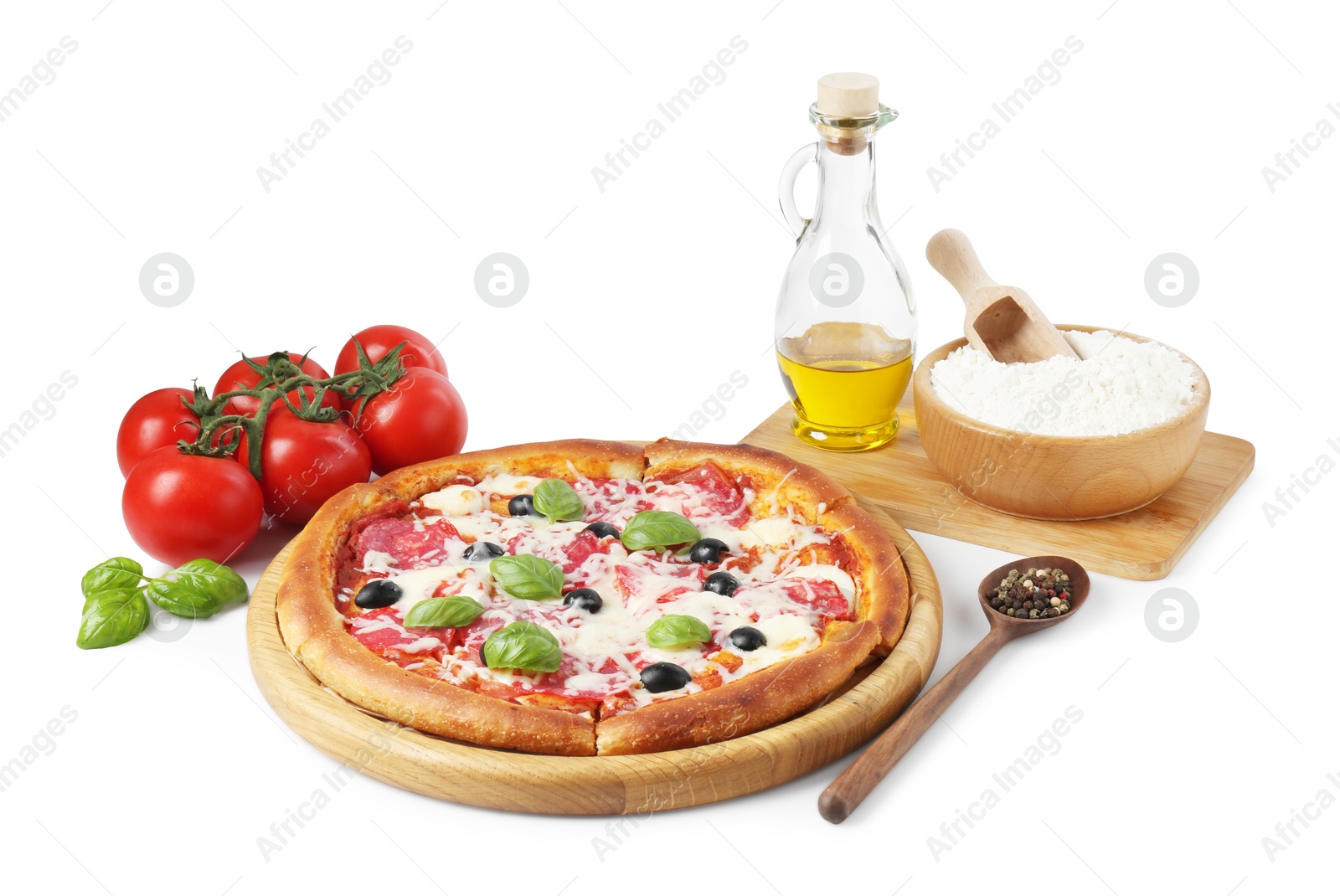 Tasty pizza and ingredients isolated on white Photo of Tasty pizza and ingredients isolated on white