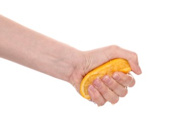 Photo of Woman squeezing orange on white background, closeup