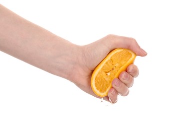 Photo of Woman squeezing orange on white background, closeup