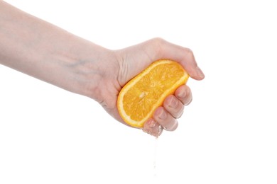 Photo of Woman squeezing orange on white background, closeup