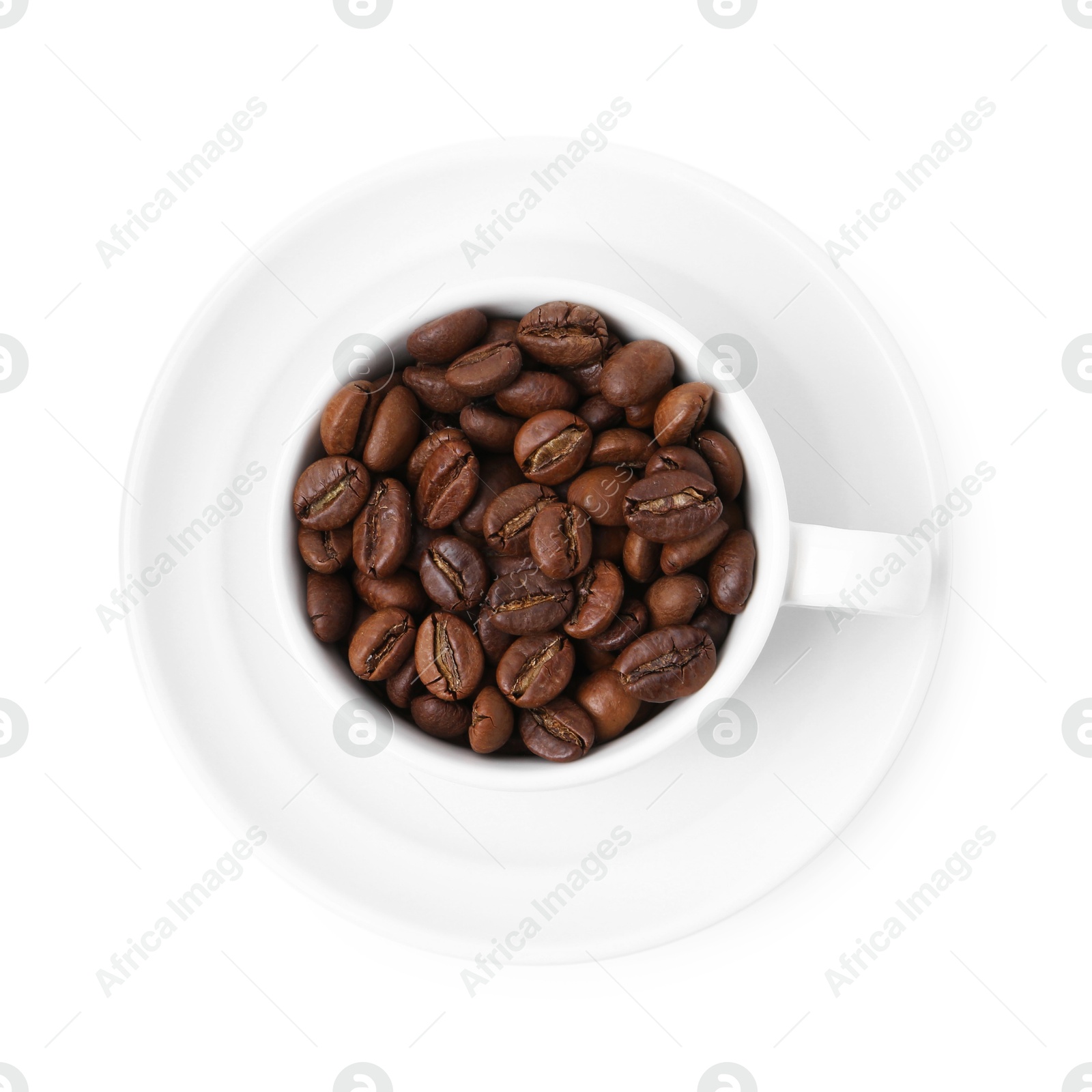 Aromatic coffee beans in cup isolated on white, top view Photo of Aromatic coffee beans in cup isolated on white, top view