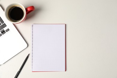 Photo of Notebook, pen, coffee and laptop on white table, flat lay. Space for text