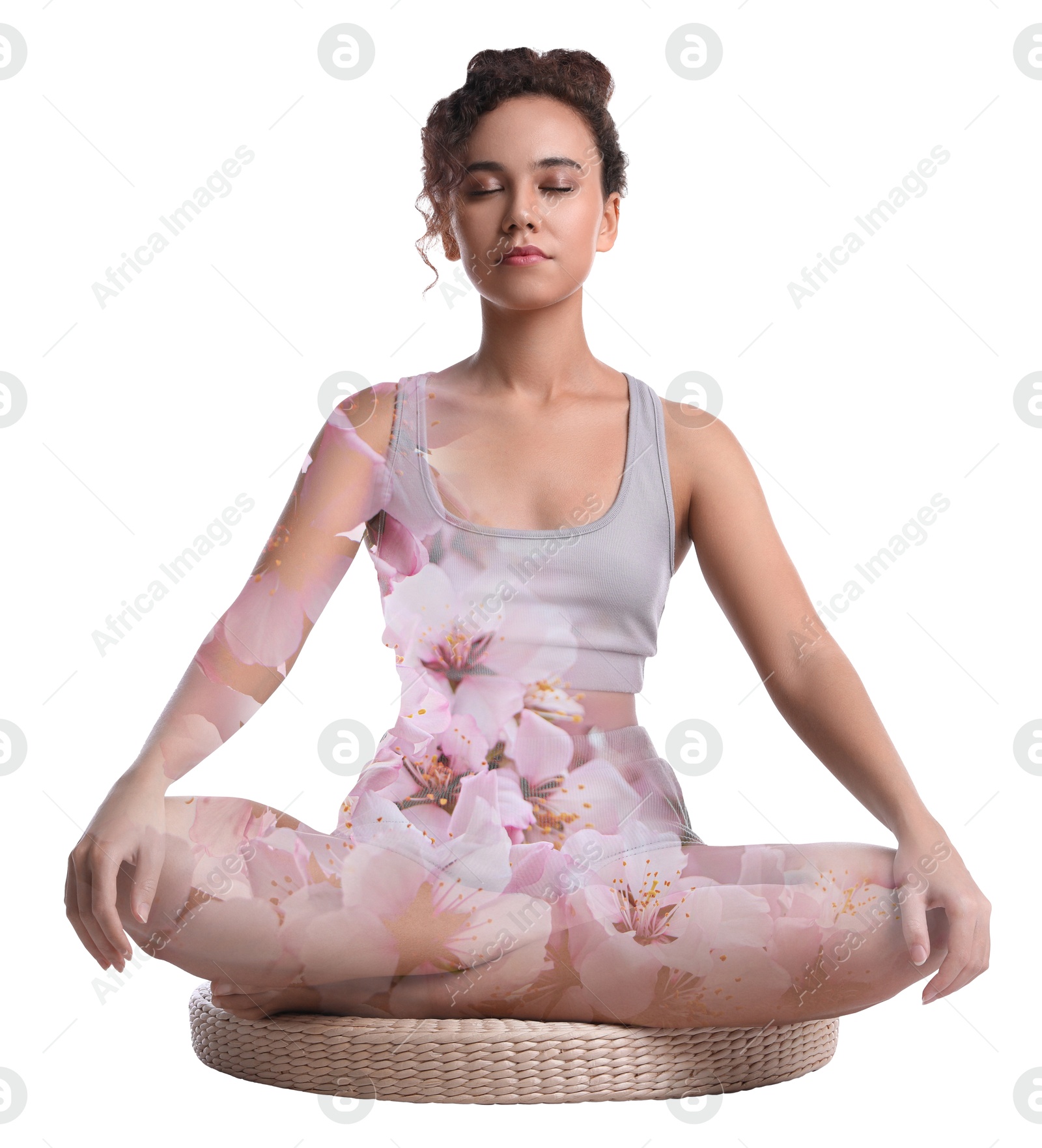 Young woman meditating during yoga practice on white background, double exposure with flowers Image of Young woman meditating during yoga practice on white background, double exposure with flowers