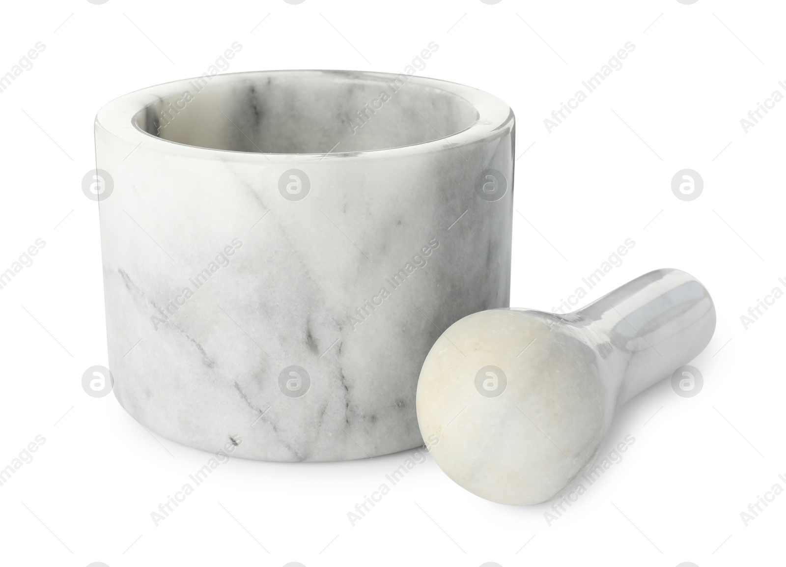 Marble mortar with pestle isolated on white Photo of Marble mortar with pestle isolated on white
